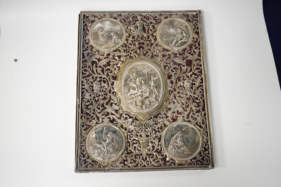 A white metal mounted rectangular desk folder, with beaded borders and pierced and decorated with scrolling foliage, birds and oval panels depicting figures at various pursuits, stamped '13', 30.6cm. Condition - poor to